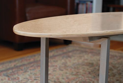 Side view of surfboard-shaped coffee table