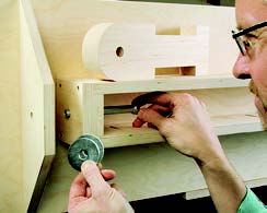 Using bolts and washers to create pivoting system