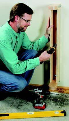 Attaching wall mounting bracket for panel storage system