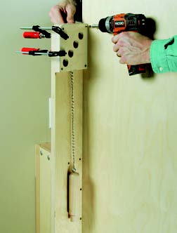 Adding peg spacer holes to panel storage system