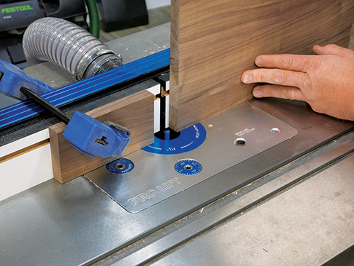 Stop block to help guide hinge router cut