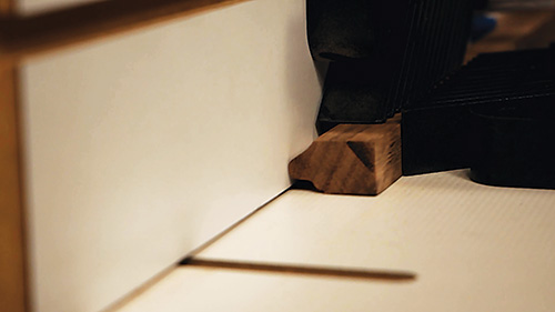 Featherboard guide keeps stock secure when routing tambour slats