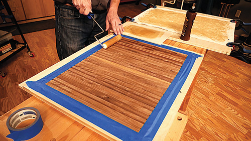 Applying hide glue to tambour slot layout with a foam roller