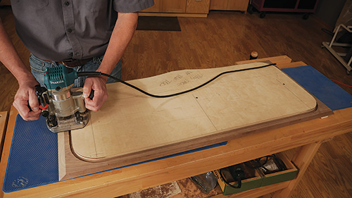 Using a template guide to rout tambour door shape