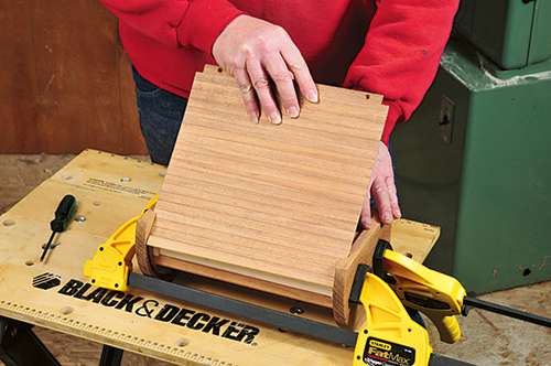 Test fitting tambour top onto clamped box assembly