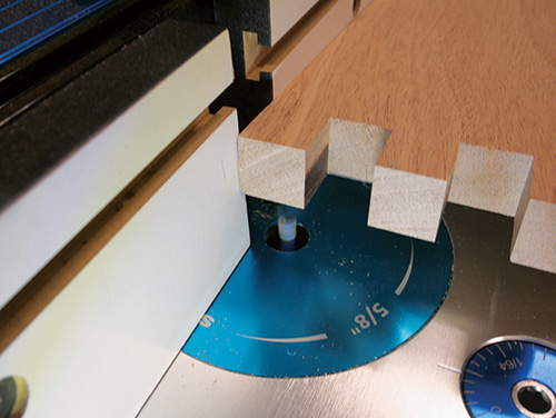 Routing groove behind box joint in panel