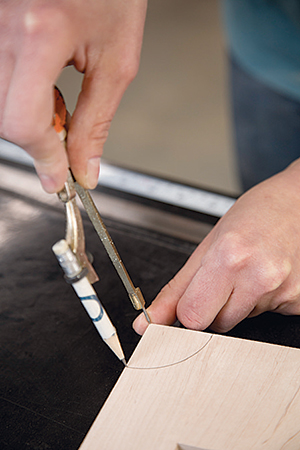 Using compass to form semi-circle cutouts