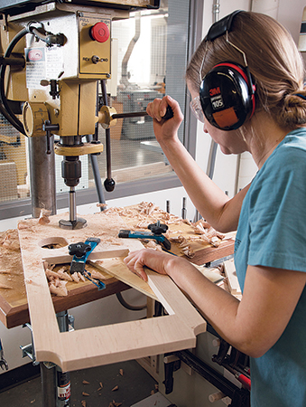 Punching out holes for clock using drill press and Forstner bit