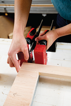 Clamping corner of clock and message board frame