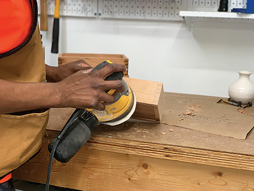 Sanding down planter box after final glue-up