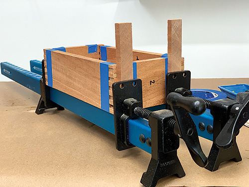 Clamping planter box parts together