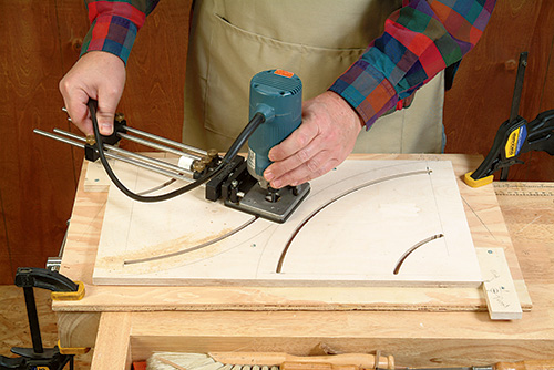 Using compass to cut tilting mechanism for router table