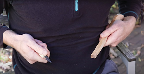 Finishing chest lever cut by pushing chest through knife cut