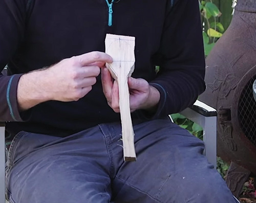 Showing spoon bend as drawn on scoop portion