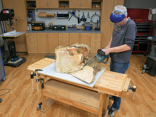 Cutting turning blank from box elder chunk with chain saw