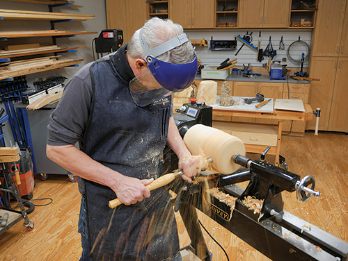 Rough turning lamp blank on lathe