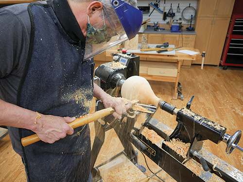 Turning lamp shape with spindle turning gouge