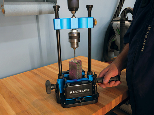 Setting acrylic blank in drilling jig