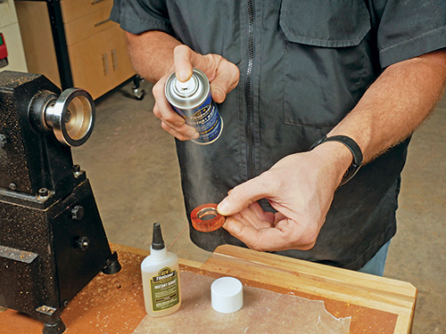 Attaching ring core to blank with spray adhesive