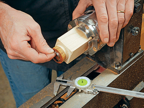 Test fitting metal ring on turned ring blank