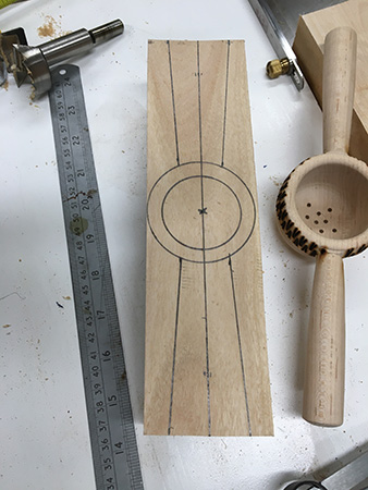 Tea strainer blank next to sample strainer