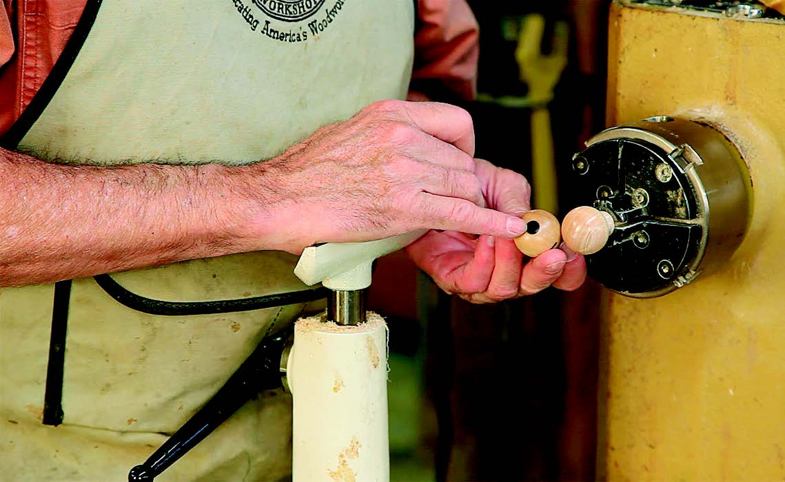 A dot, spindle-turned from a contrasting wood and inlaid in the center of a knob, is a signature of the author’s style.