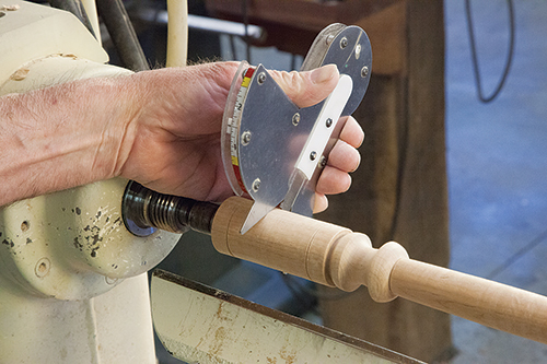 Measuring chair leg blank with Galbert caliper