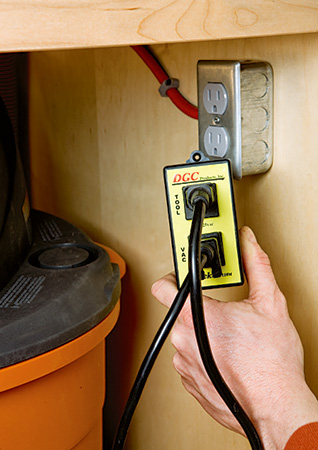 Miter saw and dust collector plug with switch