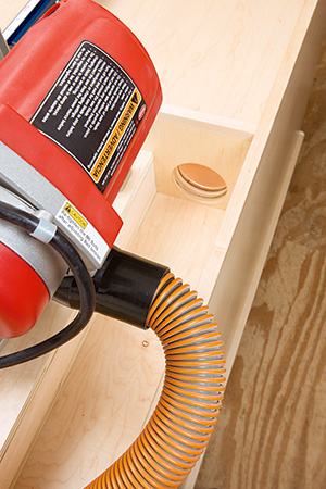 Miter saw dust collection port