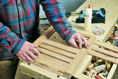 Installing slats in Ottoman panel