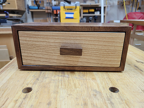 Small walnut box with drawer