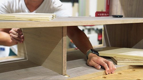 Installing vertical drawer partition in walnut cabinet