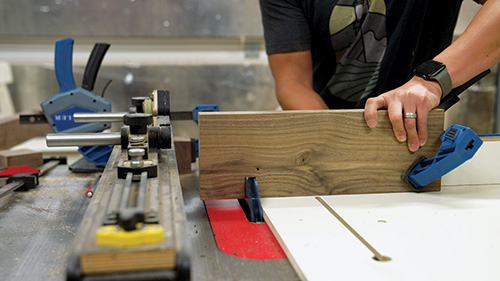 Cutting installation notches in cabinet base feet