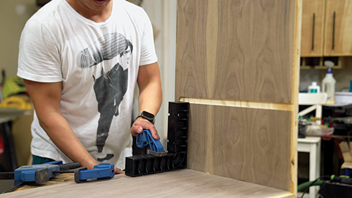 Clamping walnut cabinet pieces in place