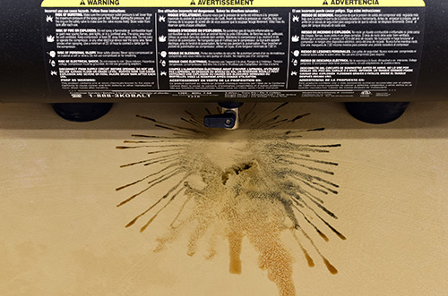 Water stain underneath an air compressor