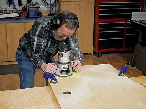 Routing hole for installing wireless phone charger