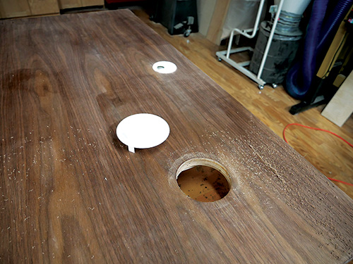 Hole in desk for wires or wireless charger and plastic cap