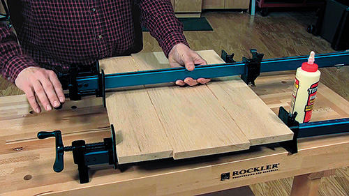 Edge gluing and clamping red oak boards