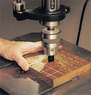 Using drill press to cut screw hole plugs