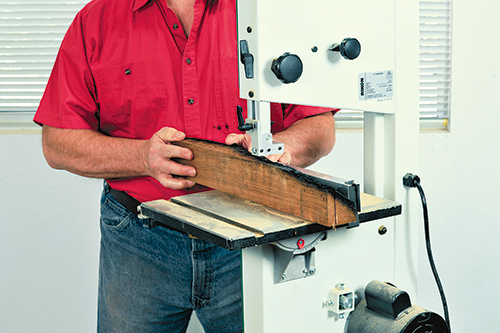 Cutting redwood planks with a bandsaw