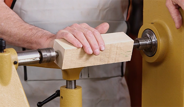 Placing turning blank in a lathe