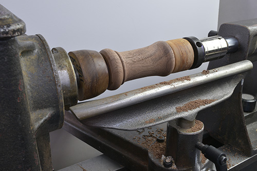 Peppermill blank mounted on a lathe