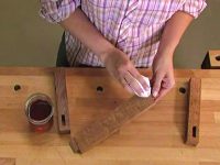 Applying shellac to inside panel of table project