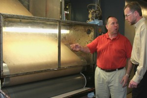 img_3098 Phillip Ali, one of four sons of founder Frank Ali, explains the process for applying resin to substrate—one of many processes carried out by "The Maker".