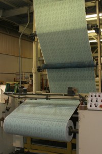 img_3111 Sandpaper is made in continuous rolls and stays that way until it is die-cut into sheets, discs, belts and various other shapes.