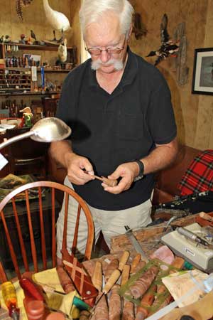 n358TWRalphJensenWithTurkeyCallOnDesk