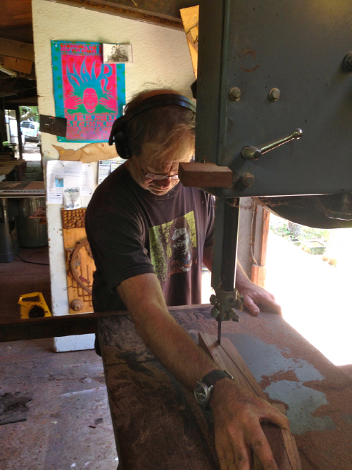 Tripp is starting to shape one of the steam bent laminations by cutting it out on the bandsaw.