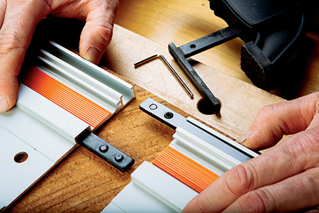 Rails for all of these test saws can be joined end-to-end with connector rods to extend their length. The rail channels also fit special clamps to secure them to workpieces and benchtops.